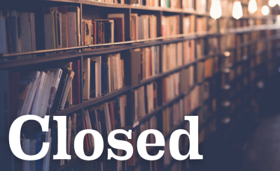 book stacks and lightbulbs hanging low