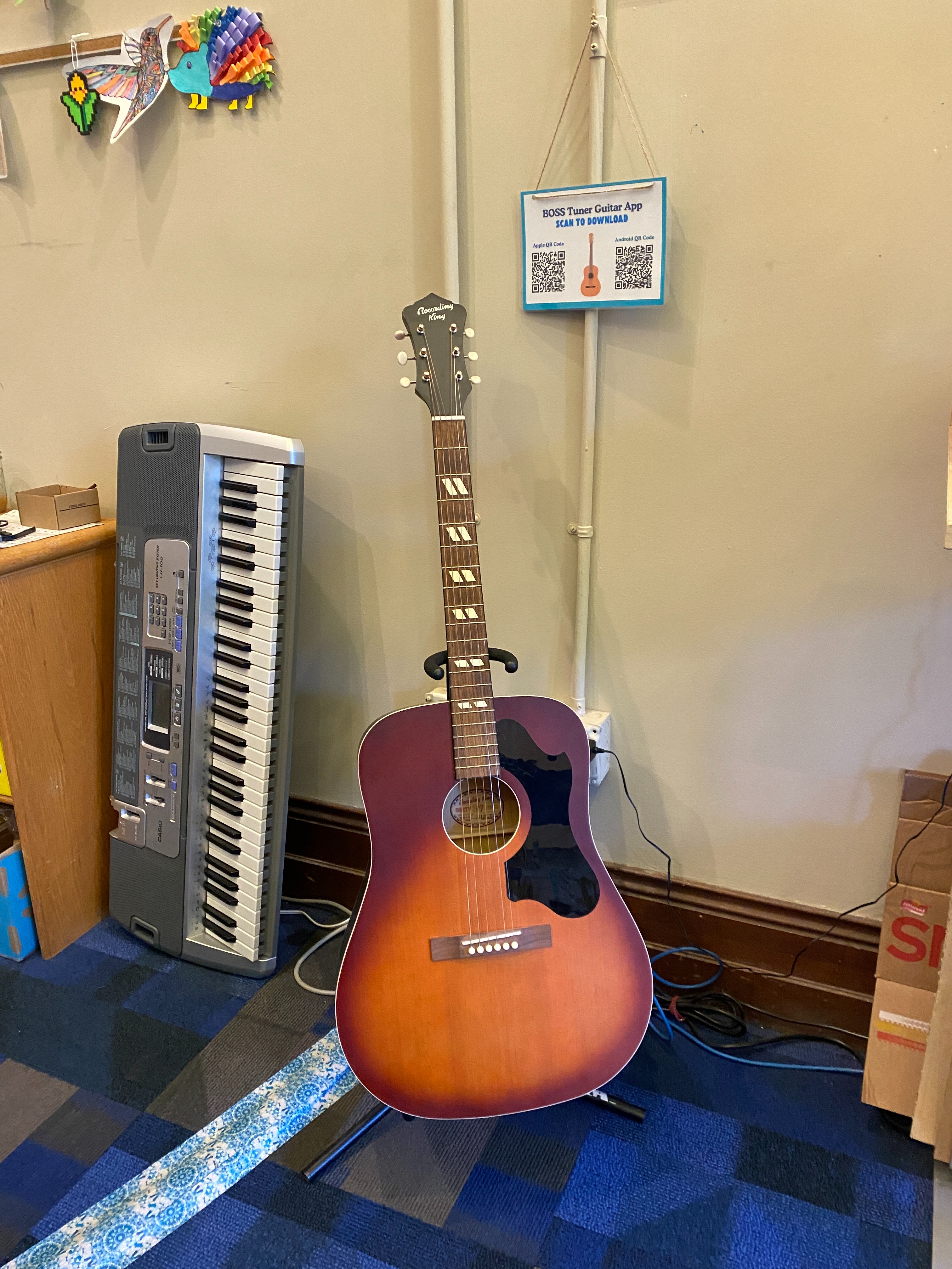 teen space with guitar and keyboard